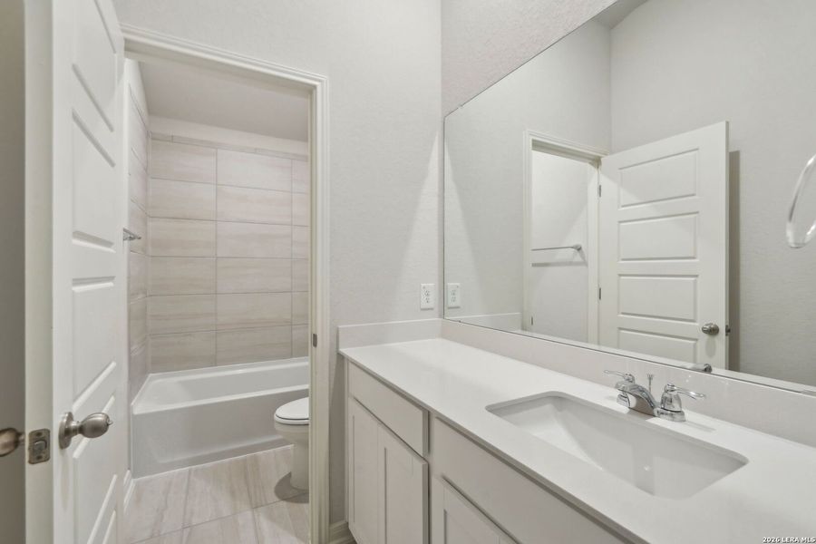 Furnished interior view inside a new home in Estancia Ranch - Classic Series, San Antonio (Image 5).