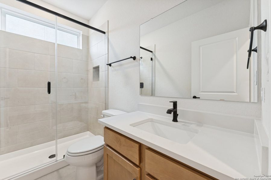 Furnished interior view inside a new home in Davis Ranch 50', San Antonio (Image 12).