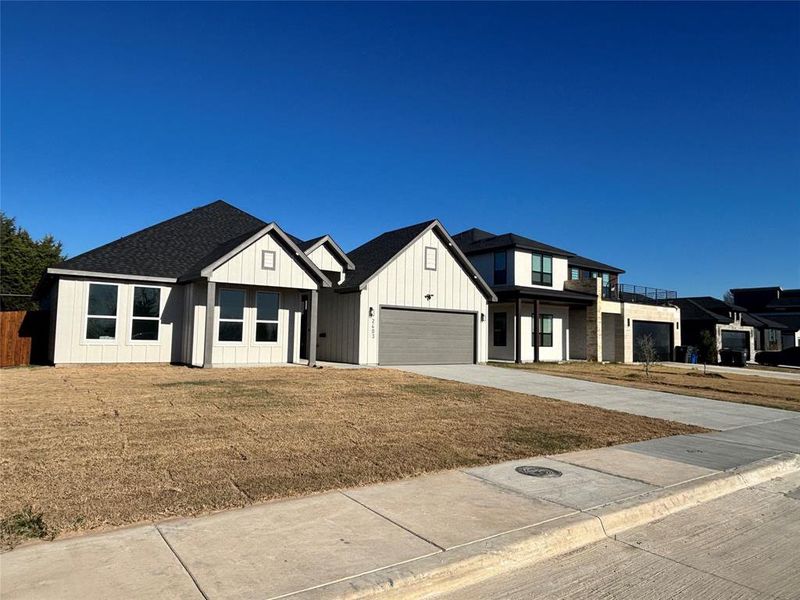 Front exterior of a new home in , Dallas, TX, highlighting curb appeal (Image 3).