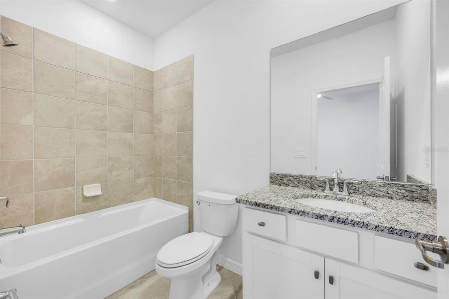 Furnished interior view inside a new home in Hampton Lakes at River Hall, Alva (Image 6).