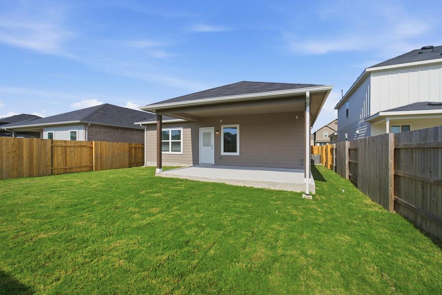 Exterior details and patio area of a home in Sunfield, Buda (Image 3).