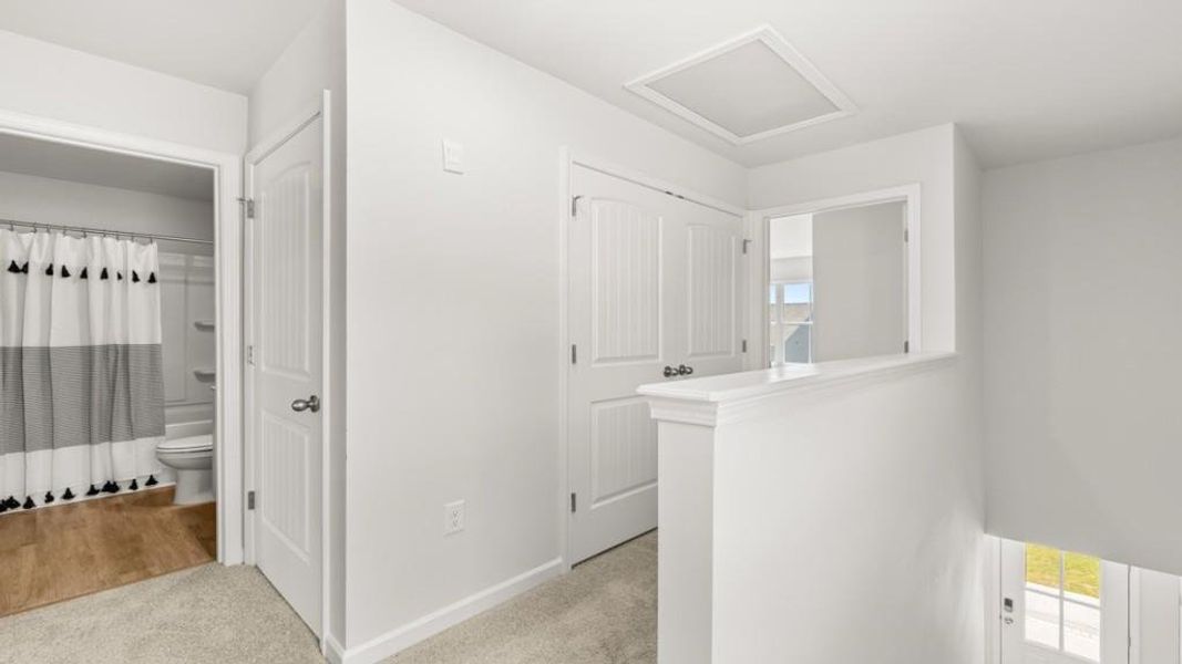 Furnished interior view inside a new home in Waypoint, Flowery Branch (Image 32).