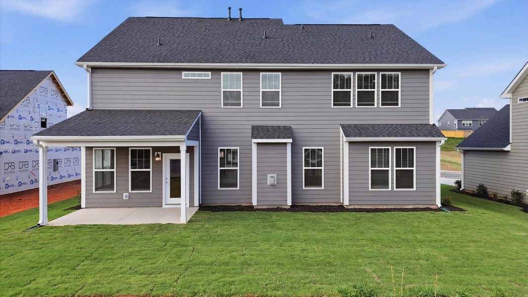 Exterior details and patio area of a home in Kayfield at Midway, Anderson (Image 3).