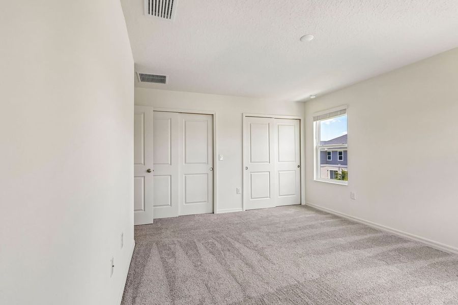 Spacious, unfurnished interior of a new home in Reserve at Forest Lake Townhomes, Lake Wales (Image 15).