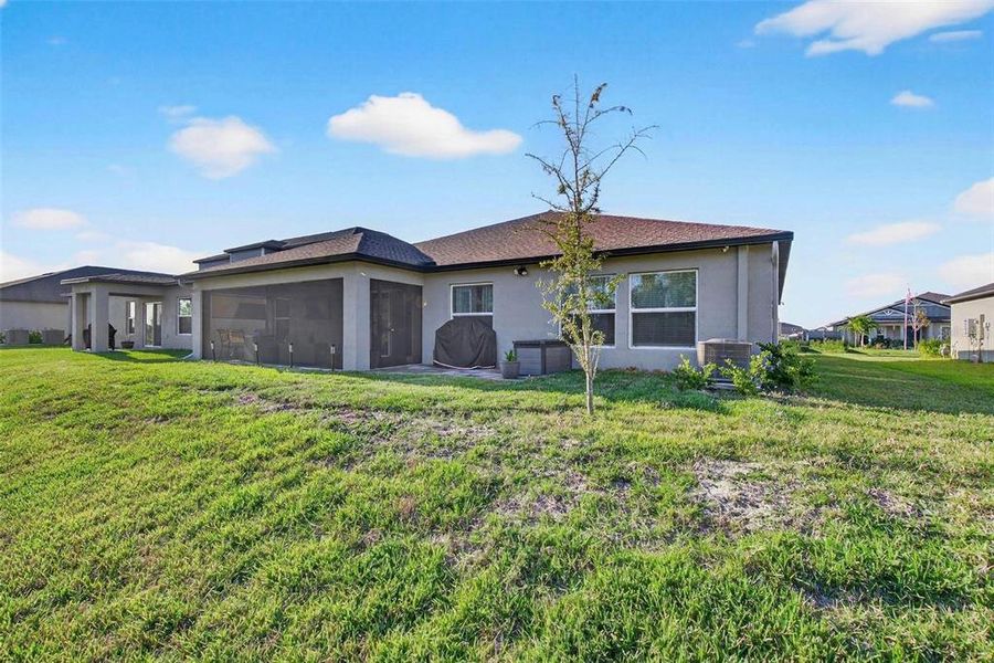 Exterior details and patio area of a home in , Parrish (Image 19).