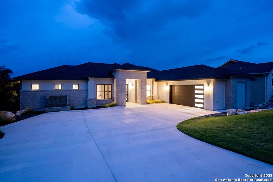 Front exterior of a new home in , Kerrville, TX, highlighting curb appeal (Image 29). Front exterior of a new home in , Kerrville, TX, highlighting curb appeal (Image 29).