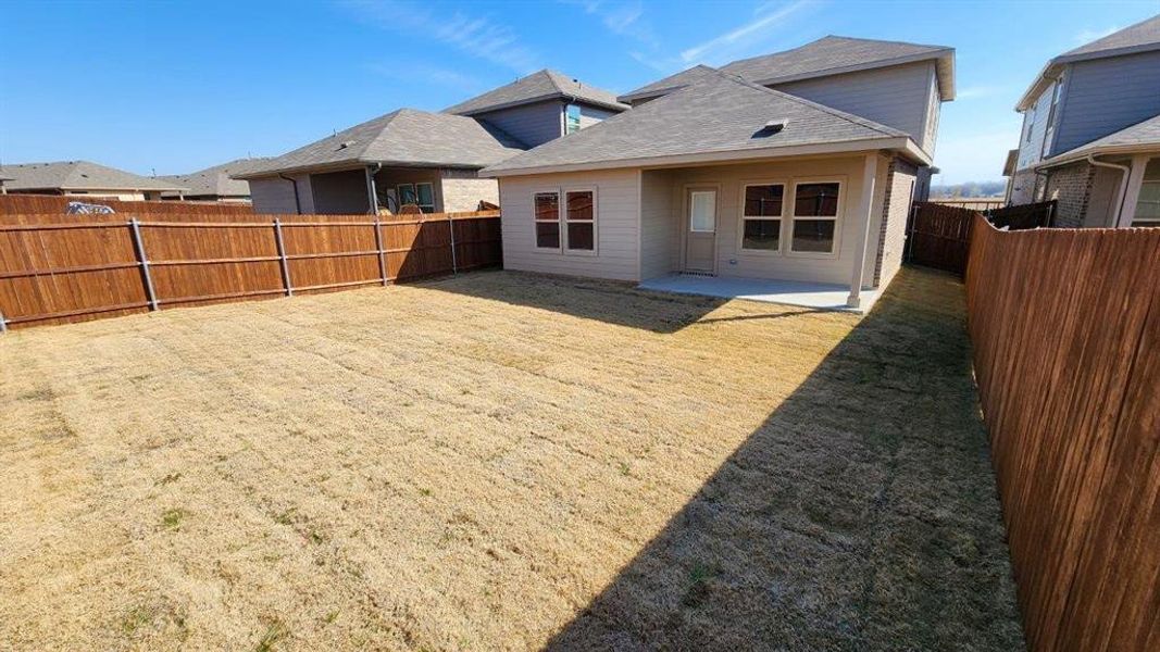 Exterior details and patio area of a home in Springhill South, Boyd (Image 3).