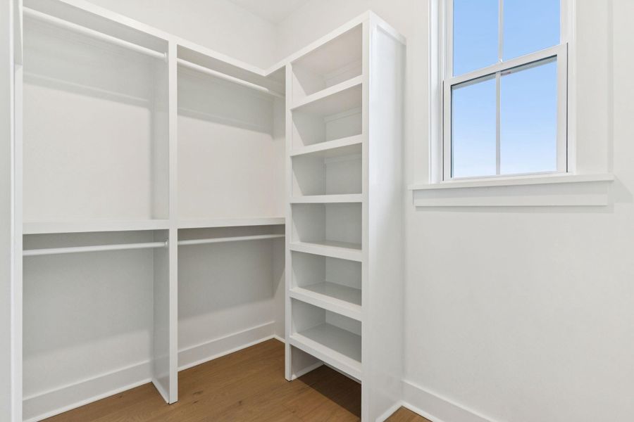 Spacious, unfurnished interior of a new home in Overlook at Copahee Sound, Awendaw (Image 39).