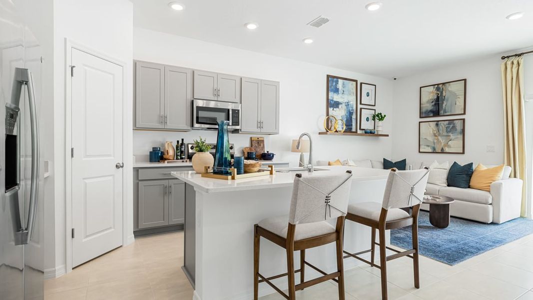 Representative furnished interior of a home built from the Jasmine by Taylor Morrison in The Towns at Tiburon, Nokomis (Image 8).