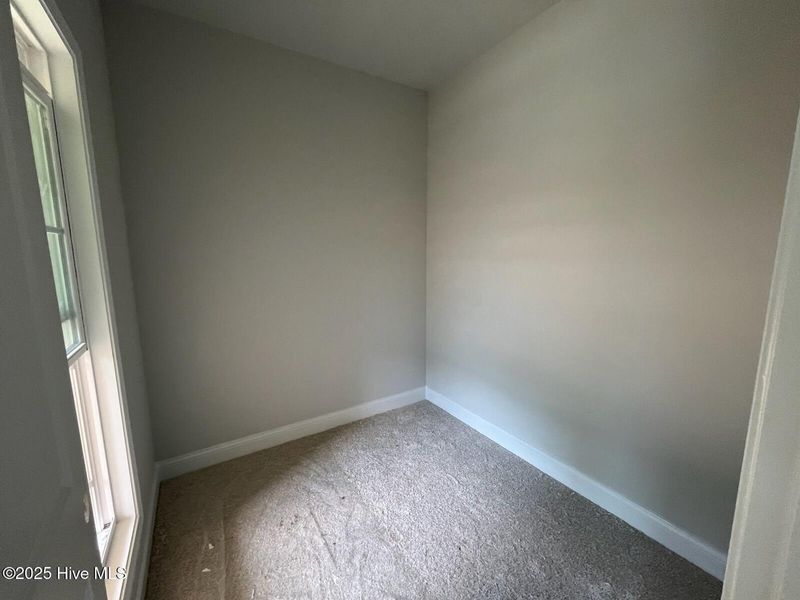 Spacious, unfurnished interior of a new home in Palmetto Creek, Bolivia (Image 11).