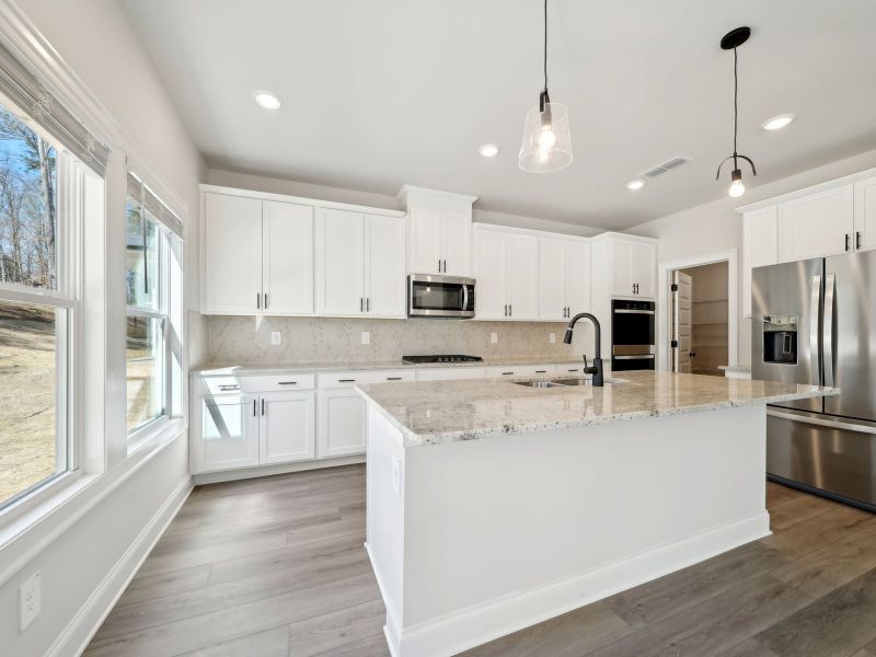 Furnished interior view inside a new home in Martin Springs - Estate Series, Lawrenceville (Image 5).