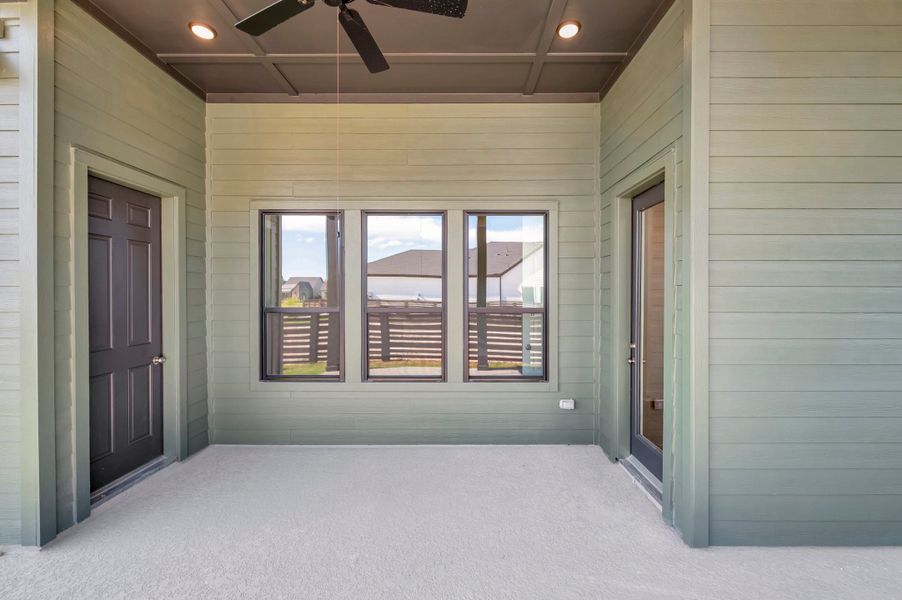 Exterior details and patio area of a home in Bridgeland Central: Emerald Heights - Enclave Row Collection, Cypress (Image 4).