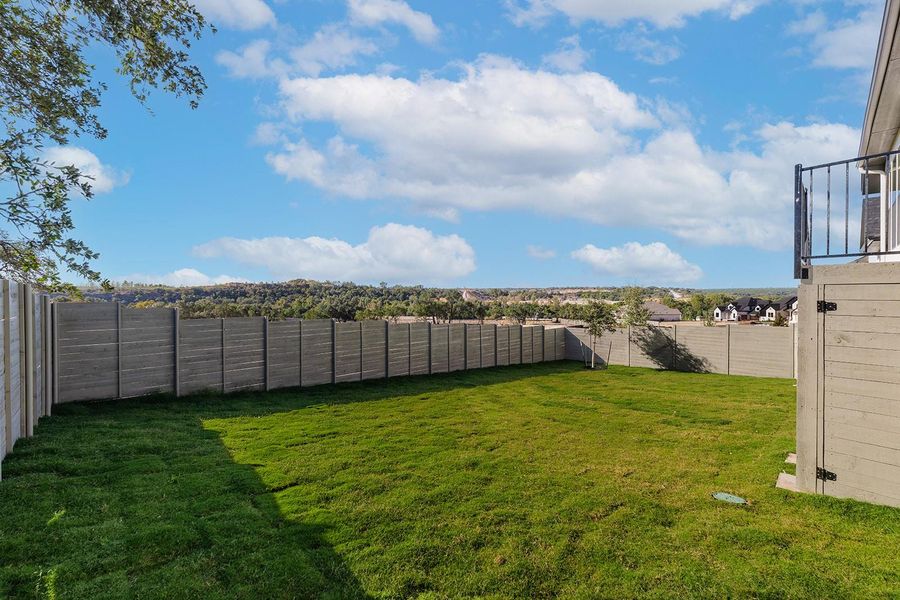 Exterior details and patio area of a home in Wolf Ranch West Bend - 60', Georgetown (Image 18).