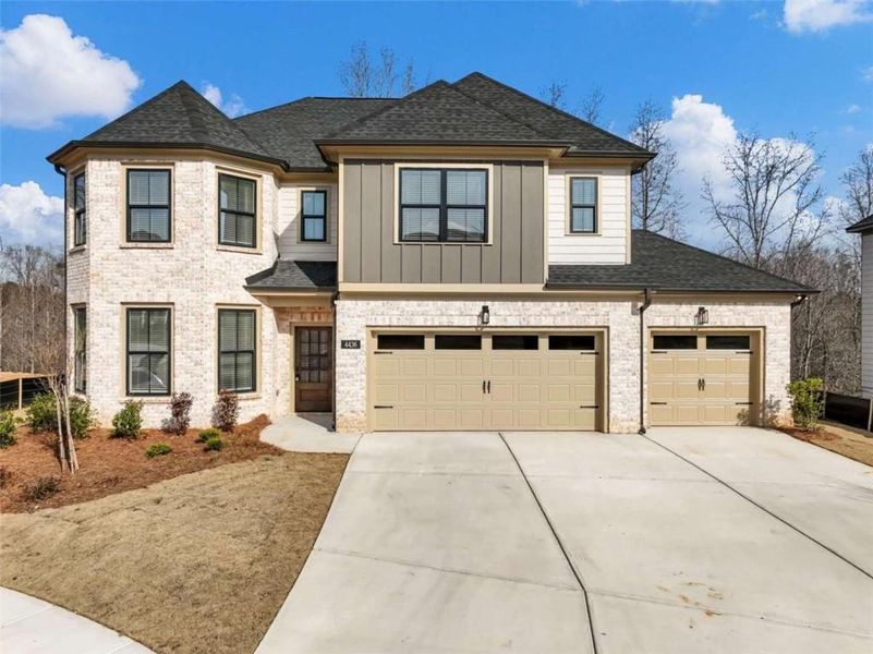 Front exterior of a new home in , Buford, GA, highlighting curb appeal (Image 25).