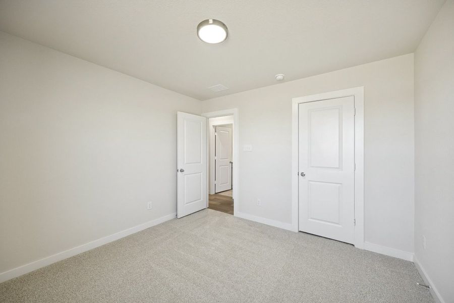 Representative unfurnished interior of a home built from the The Alamo by Lillian Custom Homes in Freeman Farm, Kaufman (Image 17). Representative unfurnished interior of a home built from the The Alamo by Lillian Custom Homes in Freeman Farm, Kaufman (Image 17).