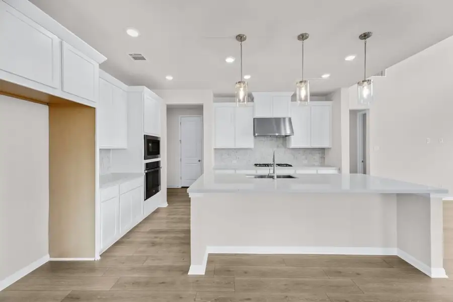 Furnished interior view inside a new home in Parkside on the River 60s, Georgetown (Image 5).