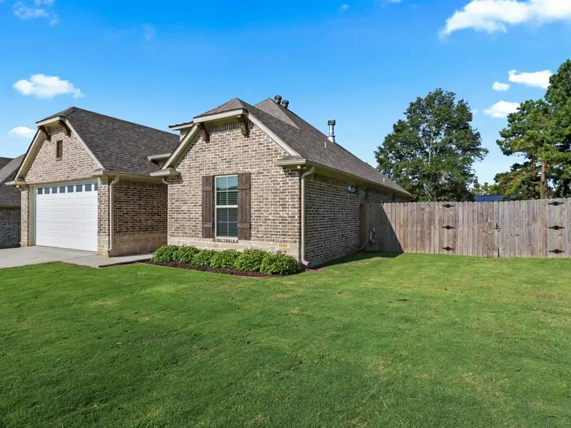 Front exterior of a new home in , Tyler, TX, highlighting curb appeal (Image 10). Front exterior of a new home in , Tyler, TX, highlighting curb appeal (Image 10).