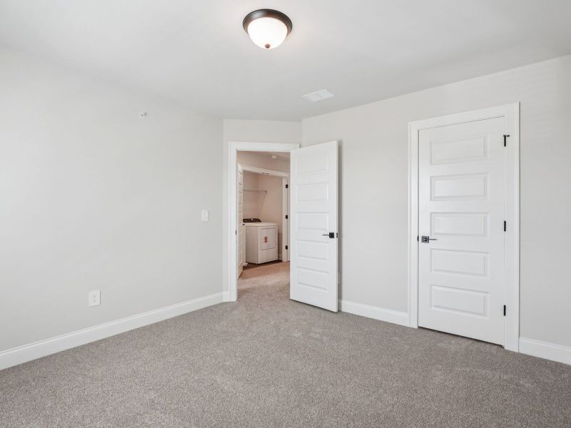 Spacious, unfurnished interior of a new home in Martin Springs - Highland Series, Lawrenceville (Image 18).