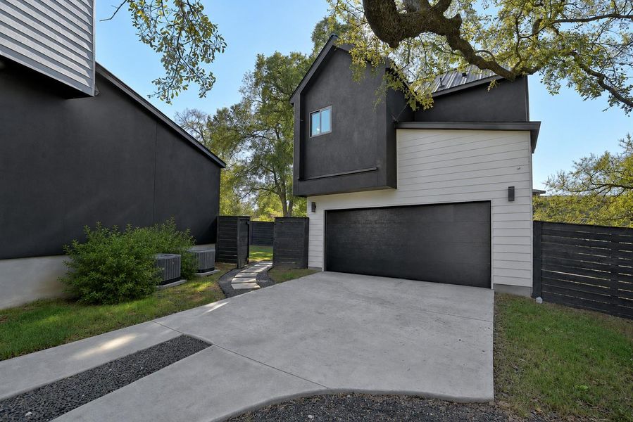 Detached separate guest house above 2 car garage in addition to the 2 car carport, and concrete driveway Detached separate guest house above 2 car garage in addition to the 2 car carport, and concrete driveway