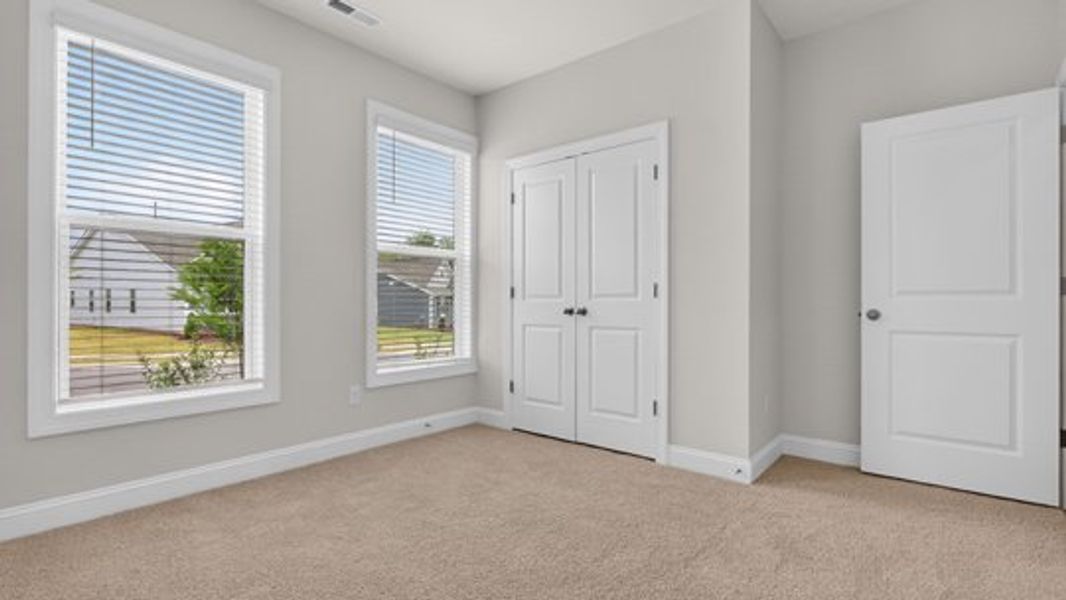 Spacious, unfurnished interior of a new home in The Manors at Haywood Glen, Knightdale (Image 18).