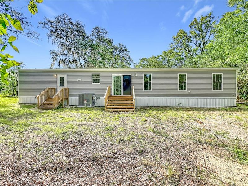 Exterior details and patio area of a home in , Satsuma (Image 23).