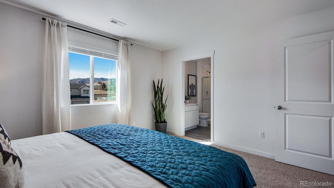 Furnished interior view inside a new home in The Ridge at Lorson Ranch, Colorado Springs (Image 20).