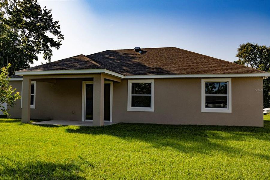 Exterior details and patio area of a home in Palm Coast, Palm Coast (Image 3).