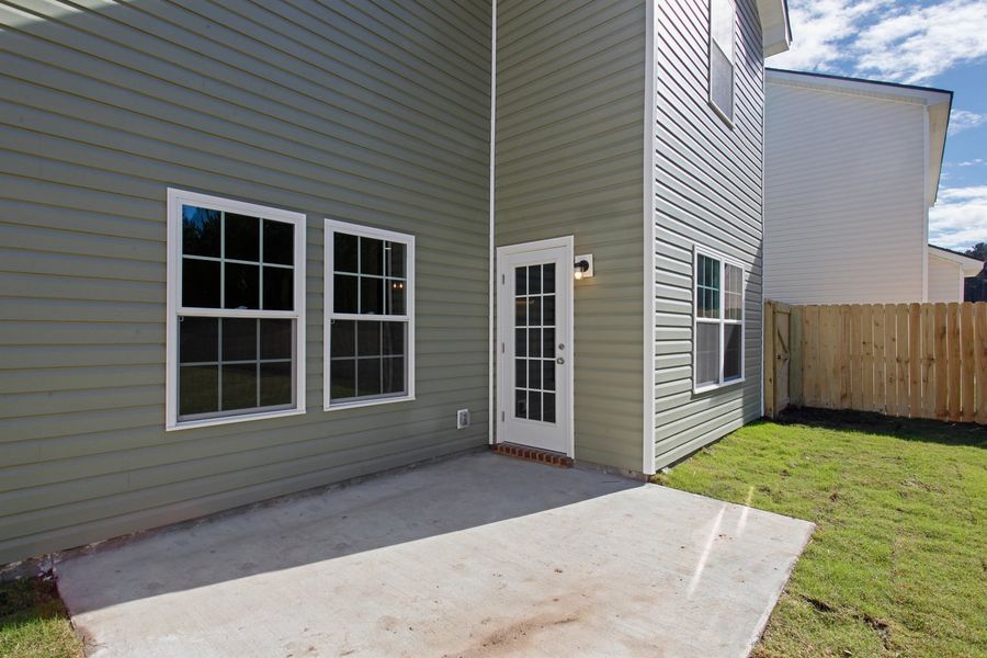Representative exterior photo of a completed home built from the The Ryon by RTS Homes in Grand Reserve, Hinesville, GA (Image 21).