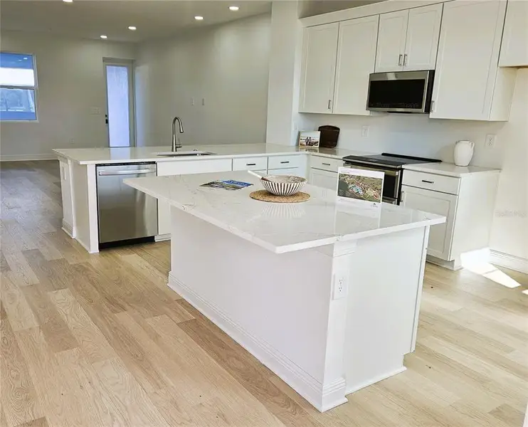 Furnished interior view inside a new home in Palmera at Wellen Park, Venice (Image 4). Furnished interior view inside a new home in Palmera at Wellen Park, Venice (Image 4).