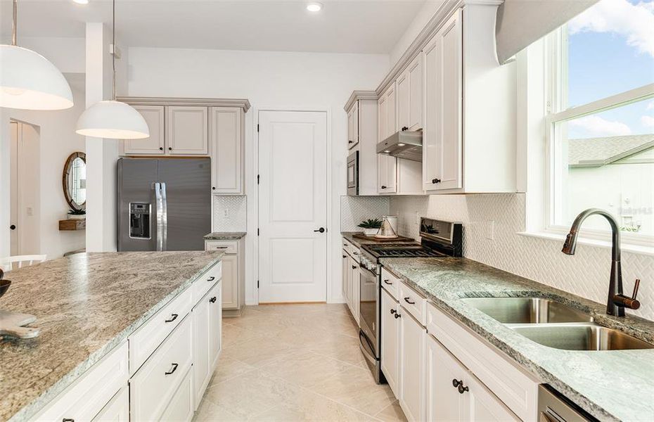 Furnished interior view inside a new home in Tohoqua Reserve, Kissimmee (Image 5).