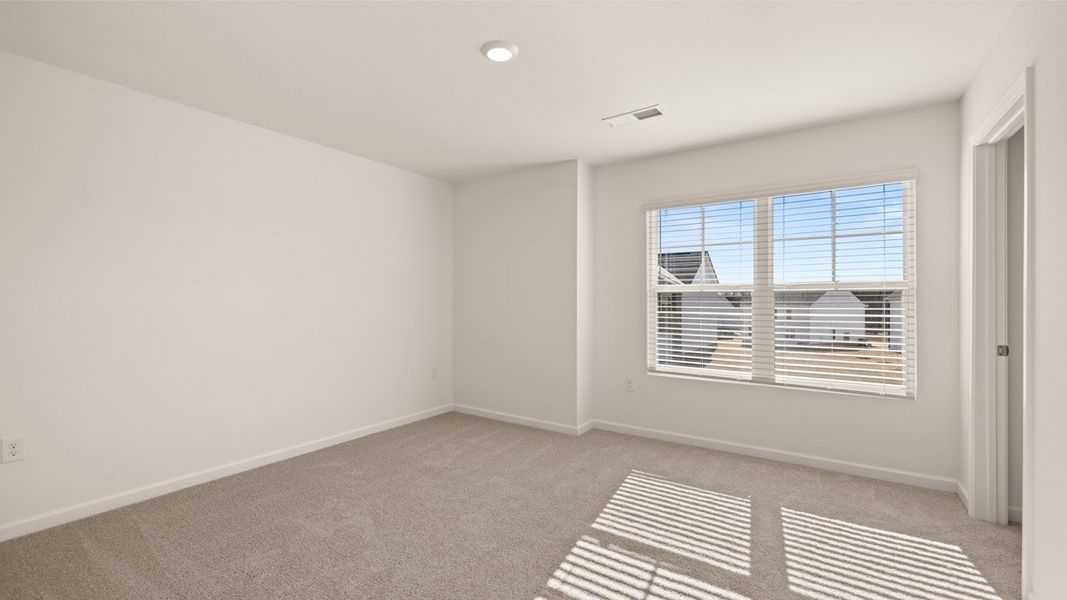 Representative unfurnished interior of a home built from the Belfort by D.R. Horton in Locust Grove Station - Cedar Ridge, Locust Grove (Image 26).