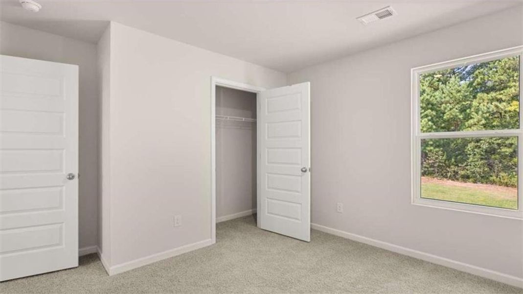 Spacious, unfurnished interior of a new home in Preserve at Dove Creek, Statham (Image 32).