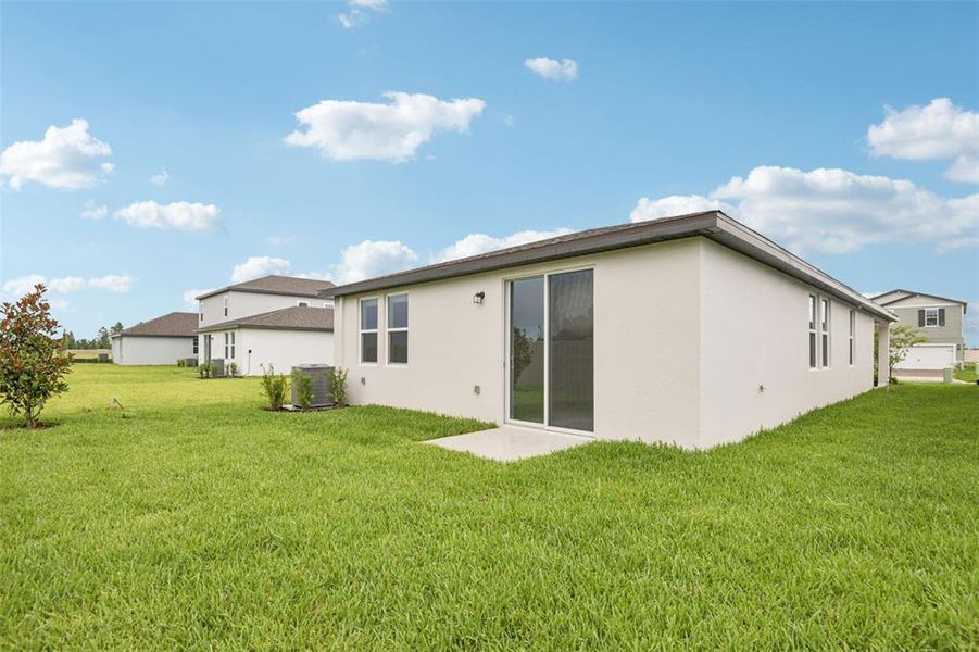 Front exterior of a new home in Two Rivers - Premier Series, Zephyrhills, FL, highlighting curb appeal (Image 2).