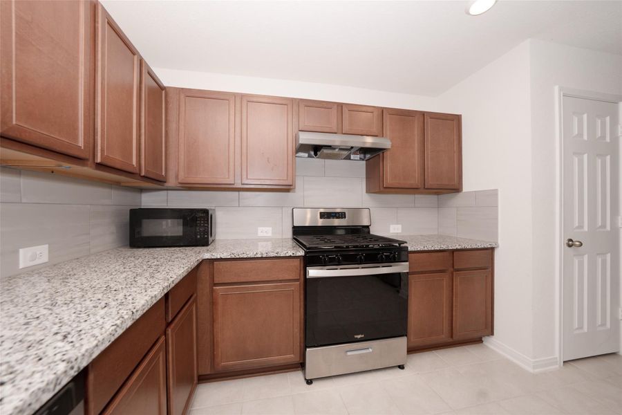 Furnished interior view inside a new home in , Katy (Image 11).
