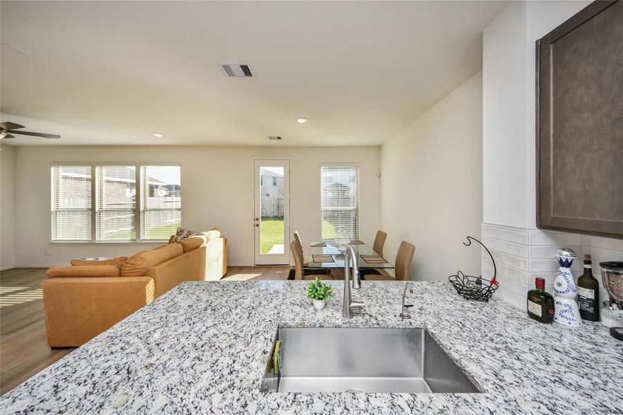 Furnished interior view inside a new home in Sunterra North, Katy (Image 5).