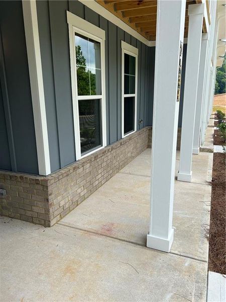 Front exterior of a new home in , Gainesville, GA, highlighting curb appeal (Image 23).
