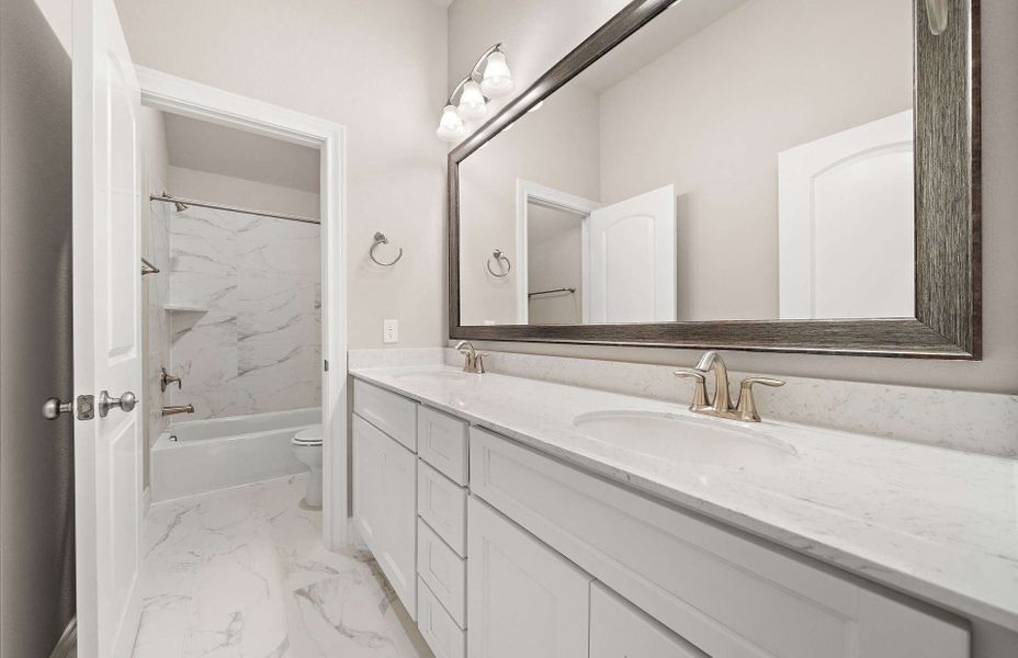 Representative furnished interior of a home built from the 3070 by Ravenna Homes in The Highlands 55′, Porter (Image 19).