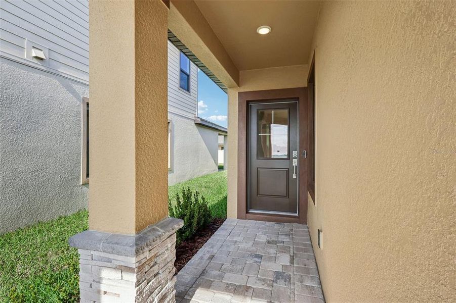 Exterior details and patio area of a home in Grasslands West, Lakeland (Image 21). Exterior details and patio area of a home in Grasslands West, Lakeland (Image 21).