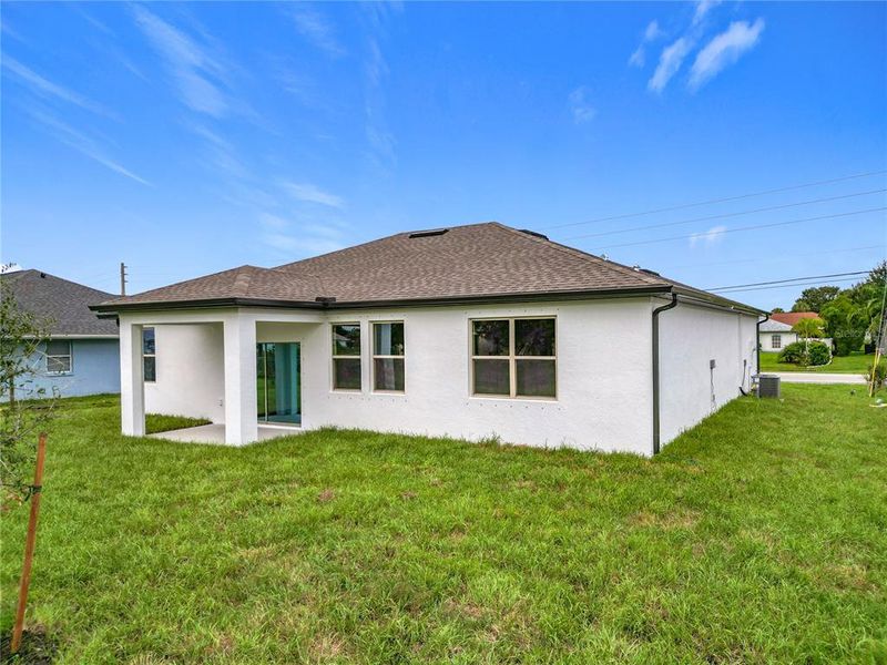 Exterior details and patio area of a home in , North Port (Image 24).