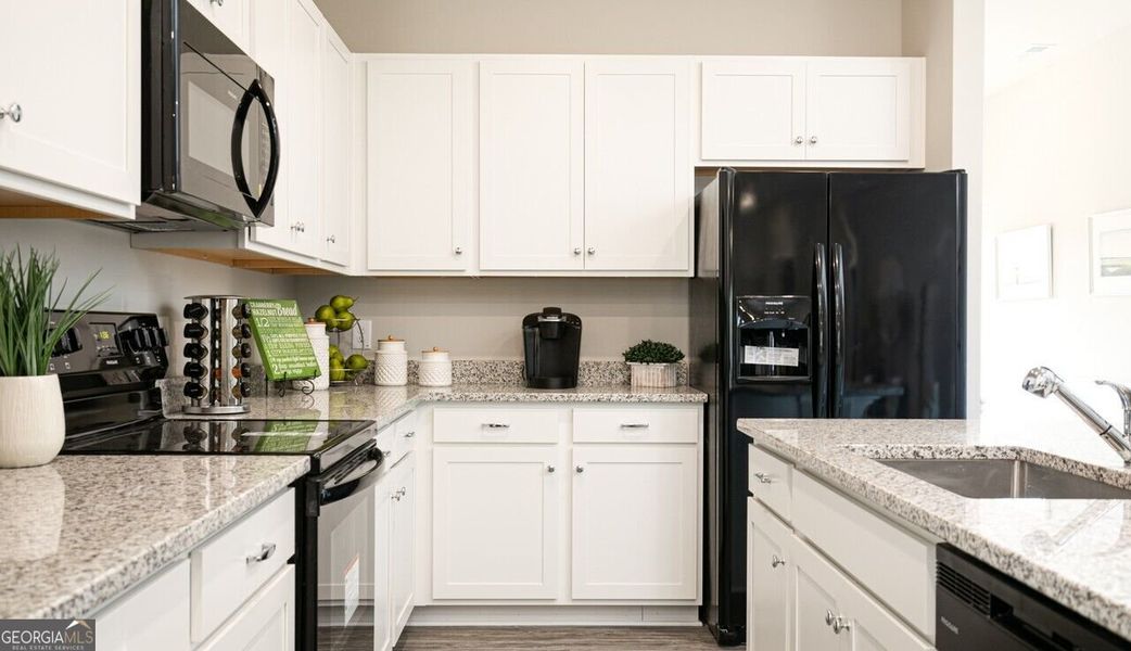 Furnished interior view inside a new home in The Cottages of Silvertown, Thomaston (Image 16).