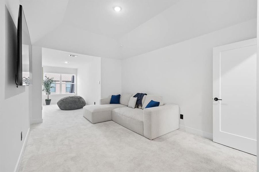 Oversized upstairs bedroom featuring carpet flooring, ensuite bathroom & walk-in closet Oversized upstairs bedroom featuring carpet flooring, ensuite bathroom & walk-in closet