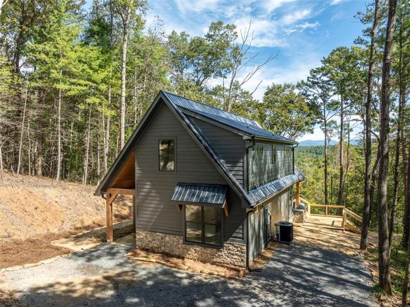 Exterior details and patio area of a home in , Ellijay (Image 28).
