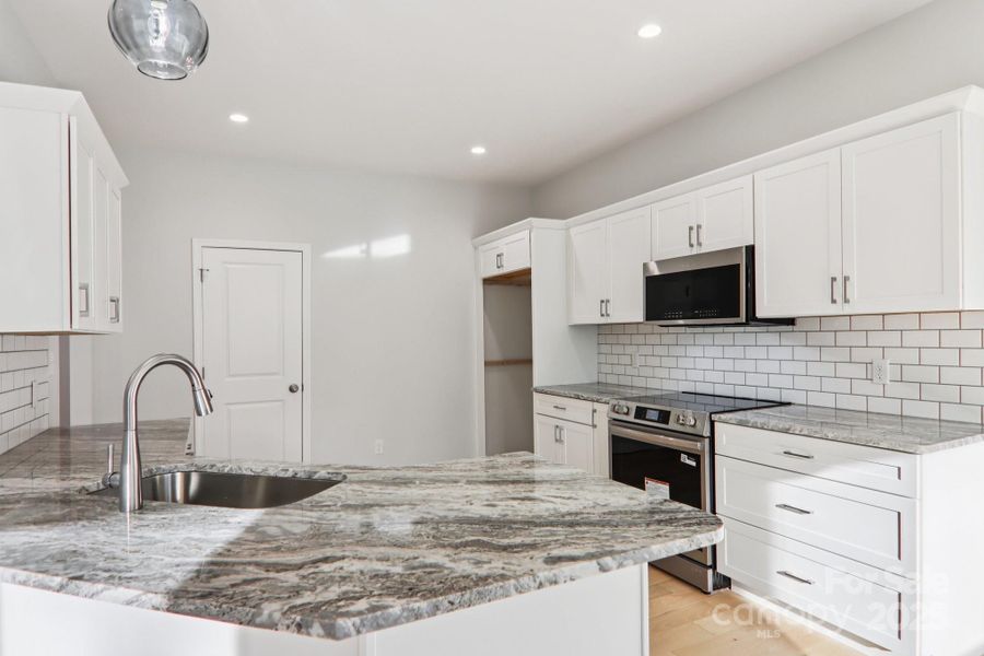 Furnished interior view inside a new home in , Candler (Image 8).