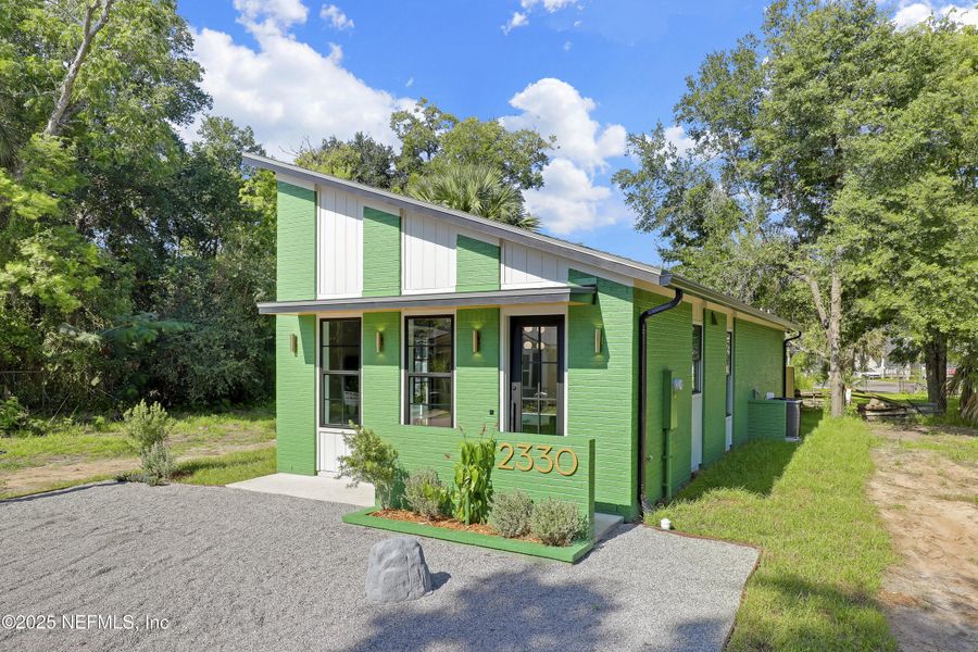 Front exterior of a new home in , Jacksonville, FL, highlighting curb appeal (Image 29).