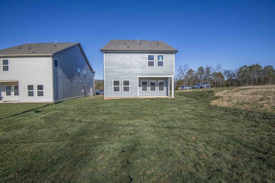 Exterior details and patio area of a home in Ivey Farms - The Grove Collection, Farragut (Image 3). Exterior details and patio area of a home in Ivey Farms - The Grove Collection, Farragut (Image 3).