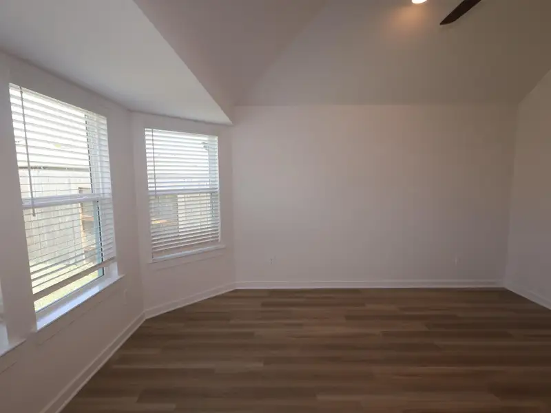 Spacious, unfurnished interior of a new home in Pinewood at Grand Texas, New Caney (Image 8).