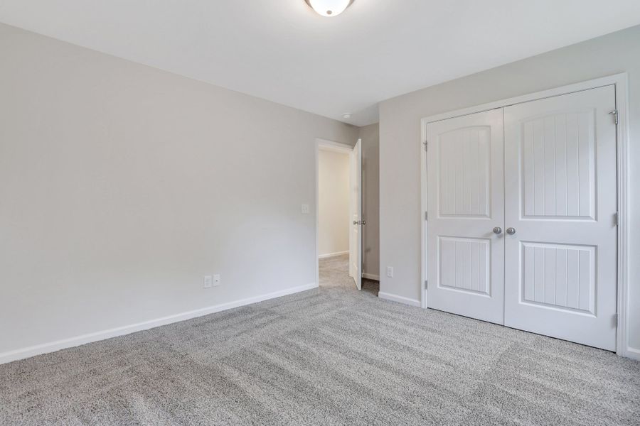 Representative unfurnished interior of a home built from the The Brookhaven by Smith Family Homes in Ramsey Landing, Rincon (Image 31).