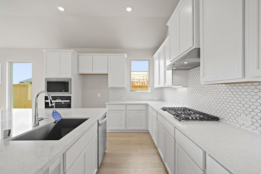 Furnished interior view inside a new home in Bridgeland 55', Cypress (Image 7). Furnished interior view inside a new home in Bridgeland 55', Cypress (Image 7).