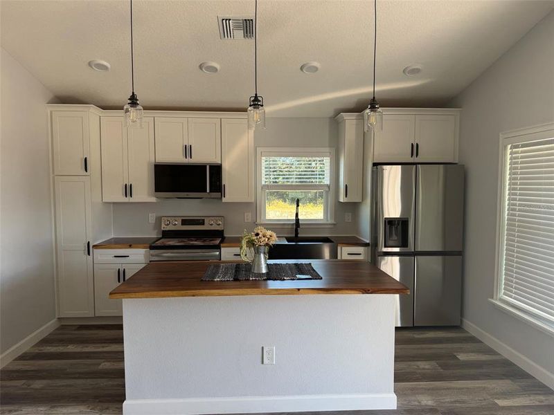 Furnished interior view inside a new home in , Okeechobee (Image 4).