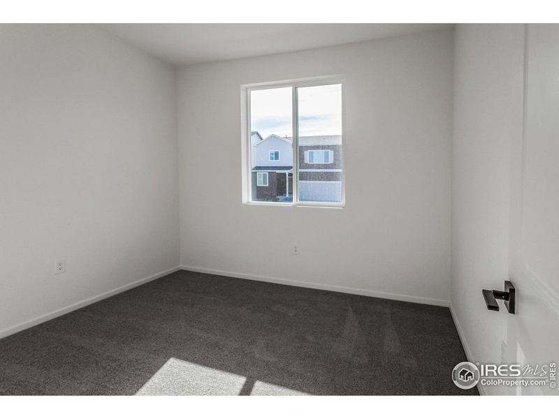 Spacious, unfurnished interior of a new home in Bloom Trailblazer Collection - Single Family Homes, Fort Collins (Image 19).